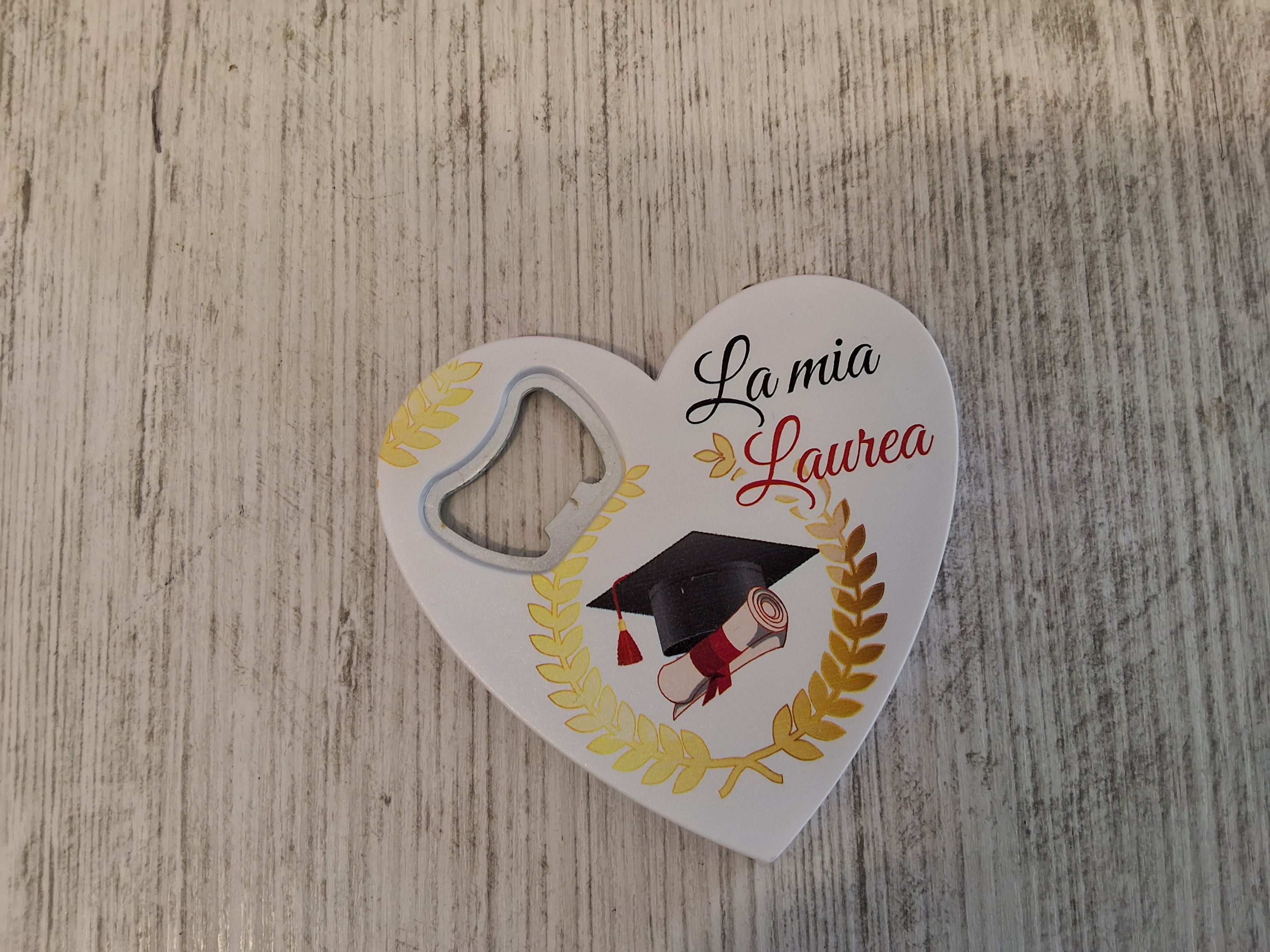 Apri bottiglia cuore Laurea mis.8,5×8